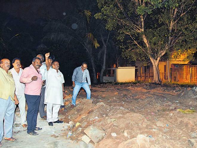 Wall of ancient temple razed for Indira Canteen, residents protest | Deccan Herald